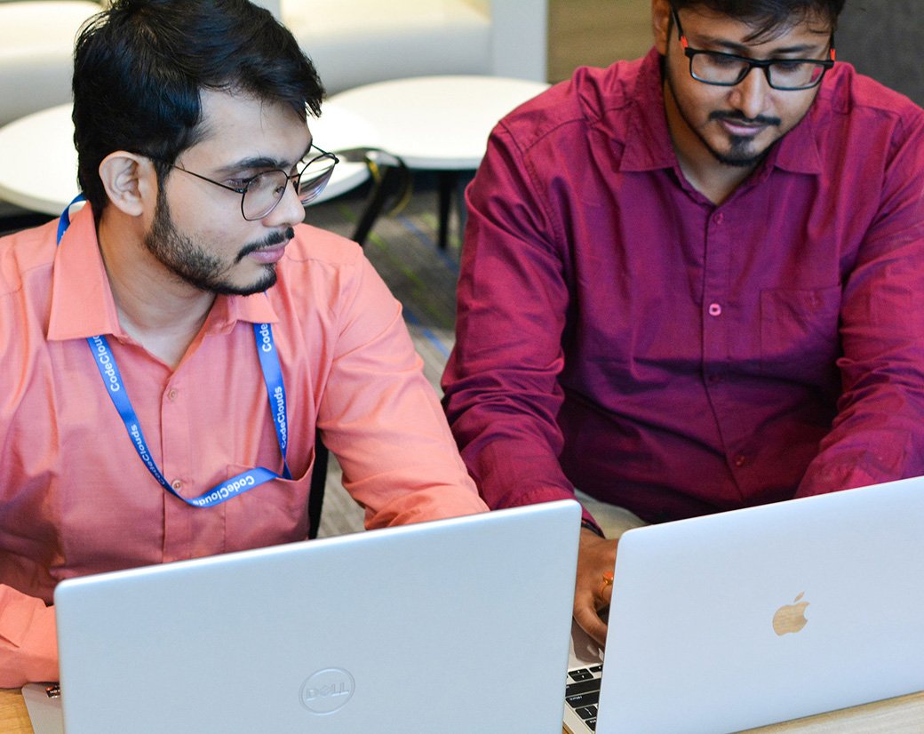 CodeClouds team reviewing an automation project