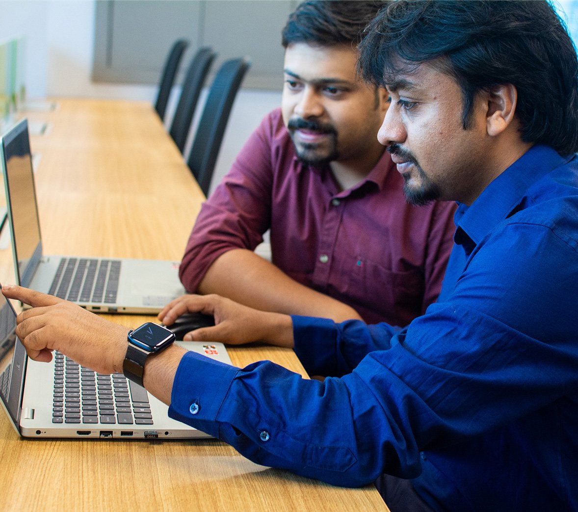 CodeClouds team reviewing an AI rescue